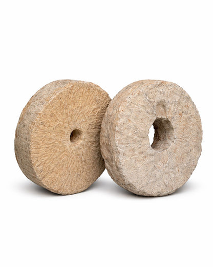 Rustic millstones (diameter +/- 33 cm)