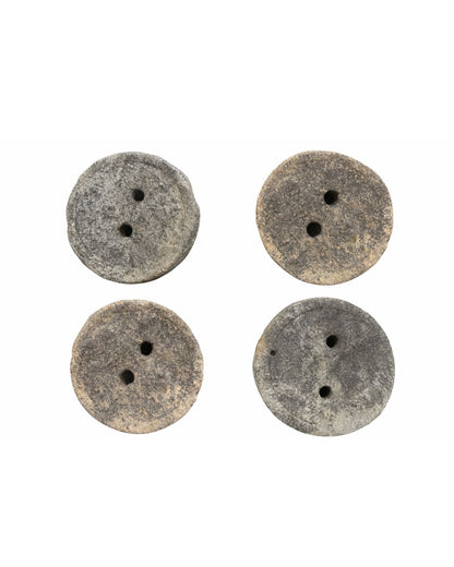 Rustic millstones (diameter +/- 63 cm)