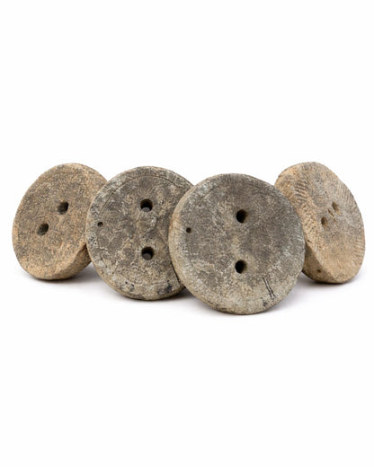Rustic millstones (diameter +/- 63 cm)